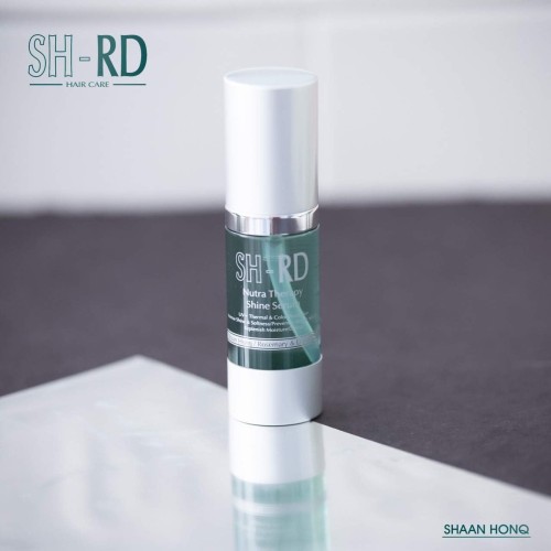 SH-RD Nutra-Therapy Shine Serum. Defrizz. UV + Thermal & Color Protection. Intense Shine and Softness. Prevent + Repair Split Ends. Replenish Moisture